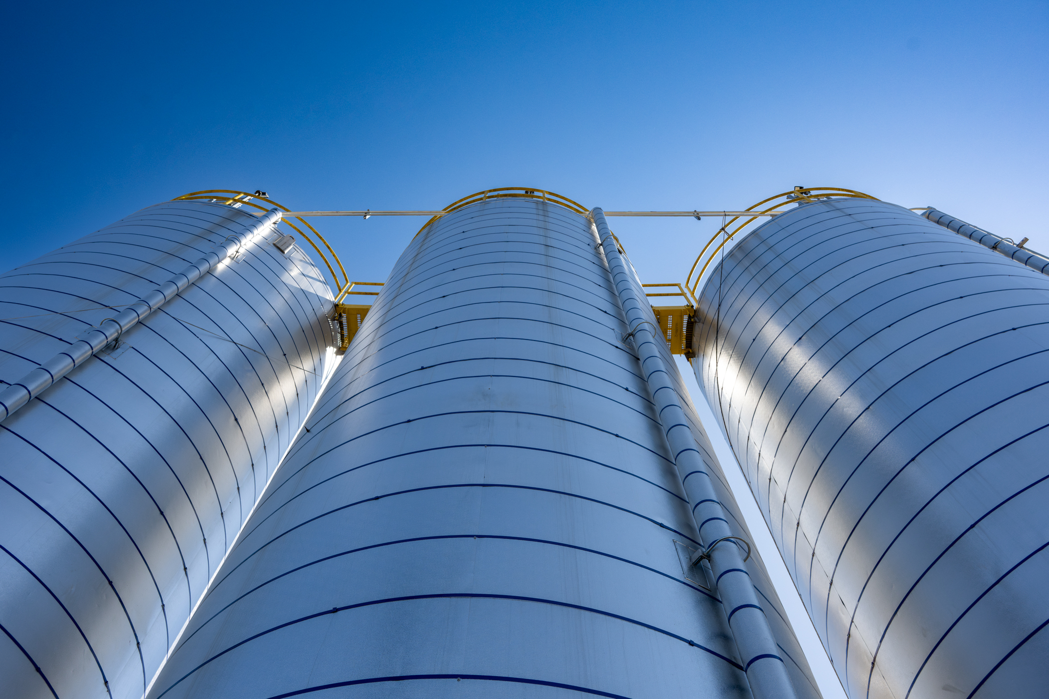 Large metal cylindrical towers.